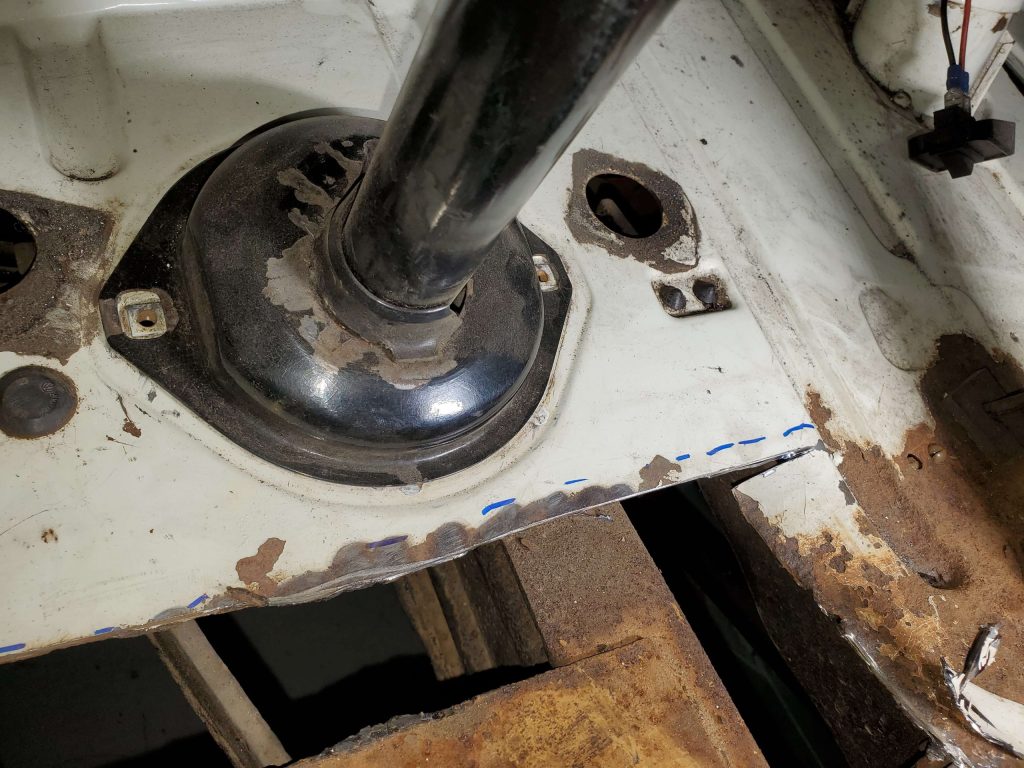 Front floor of 1973 Volkswagen Westfalia Bus around the steering column.