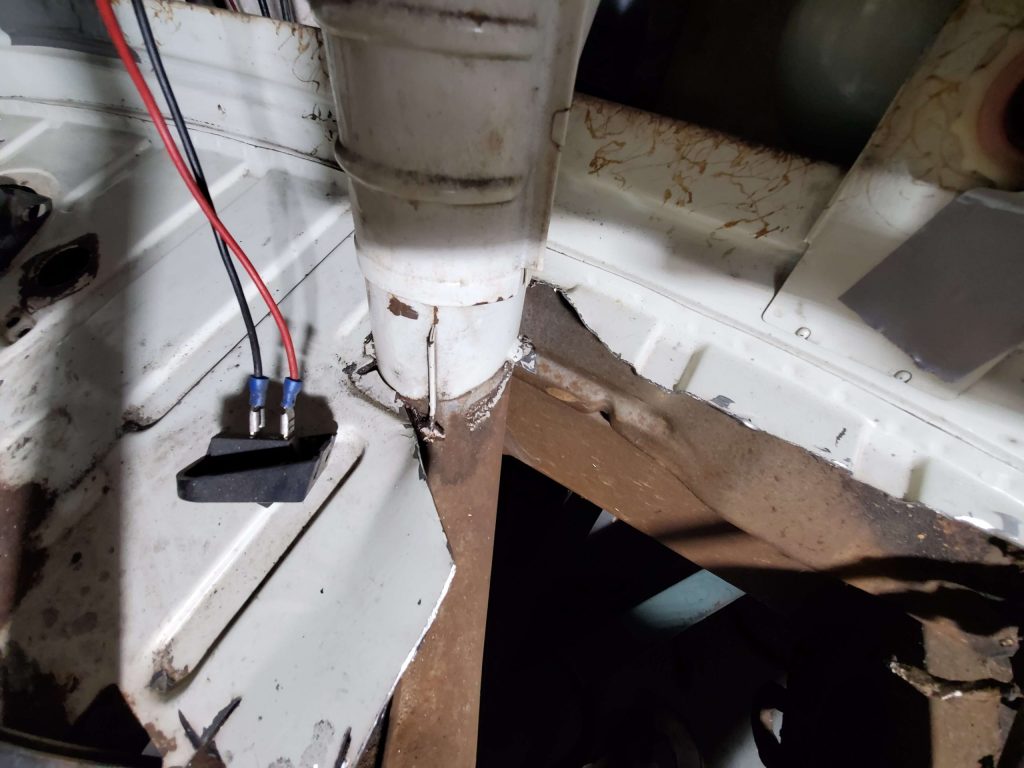 Front floor on passenger's side.